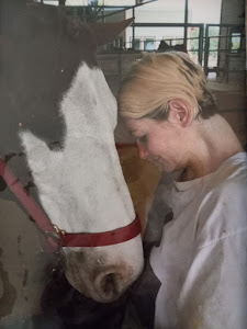 Errhyn sharing a quiet moment with a horse